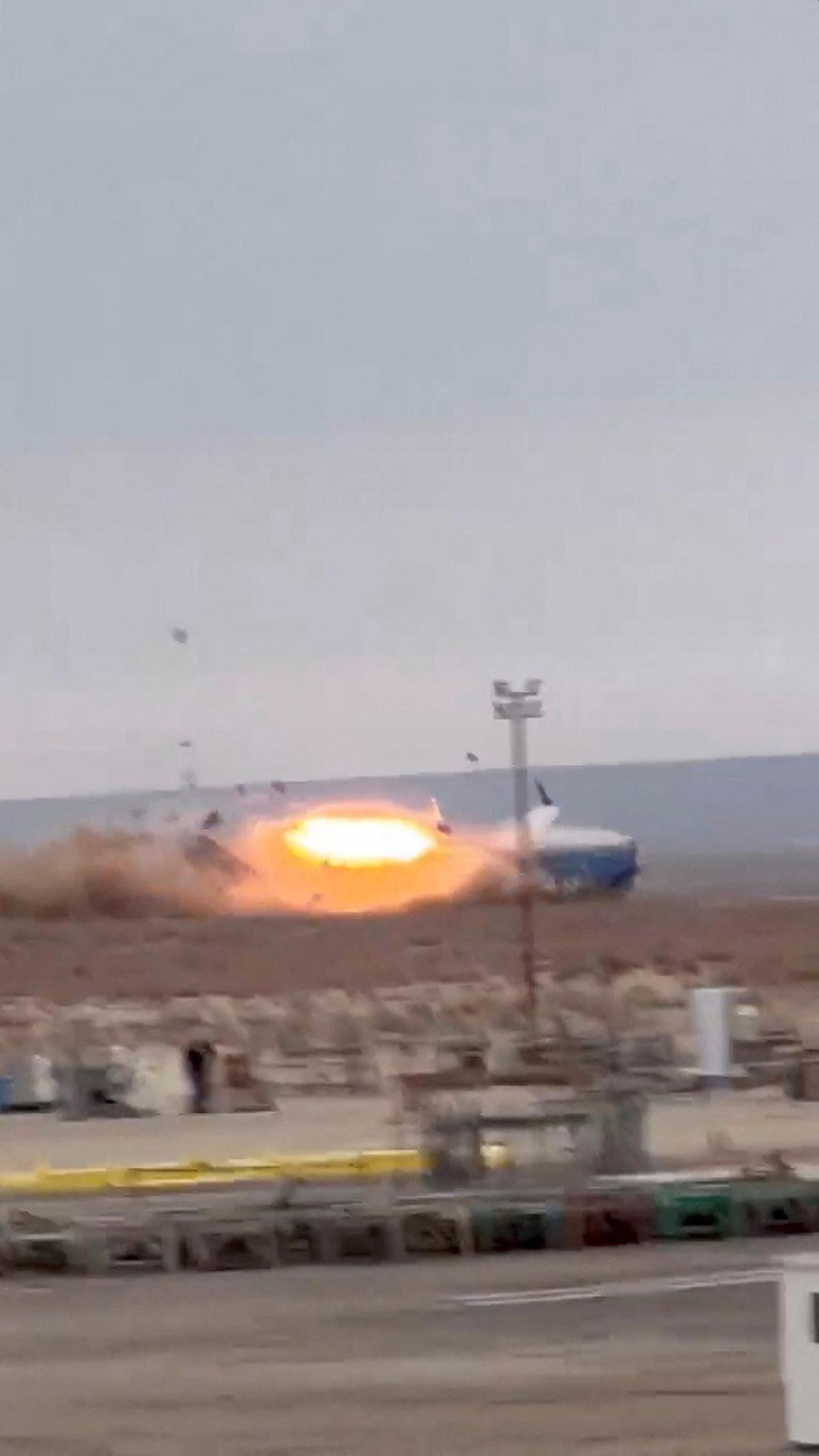 A view shows a moment of crash of an Azerbaijan Airlines’ Embraer passenger plane near the city of Aktau, Kazakhstan December 25, 2024 in this screengrab from a video obtained from social media.