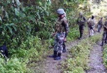 Security personnal during a search operation on hidden IEDs at Maphitel Ridge near Monglham during a joint search operation, in Imphal East, Manipur