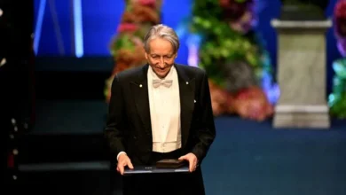 Nobel Laureate in Physics Geoffrey E. Hinton holds his award at the Nobel Prize ceremony in the Konserthuset in Stockholm, Sweden, on December 10, 2024.